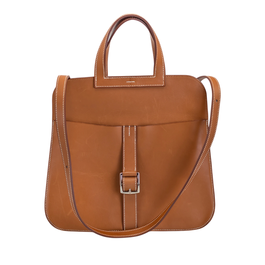 Secondhandbags AG Hermès Halzan brown leather handbag with top handles, shoulder strap, and silver buckle detail.