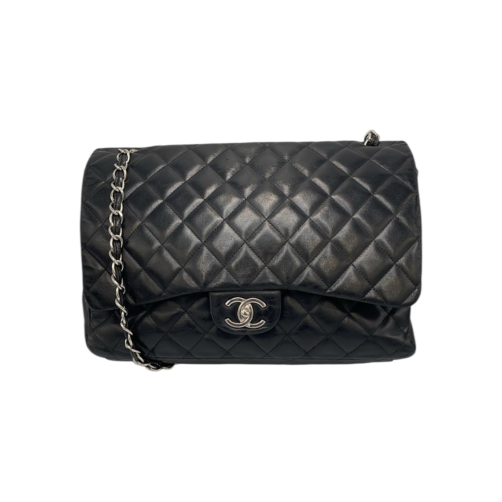 <h1>Die Zeitlose Eleganz: Chanels Klassischer Schatz in Schwarzem Lammleder mit Silberdetails</h1>