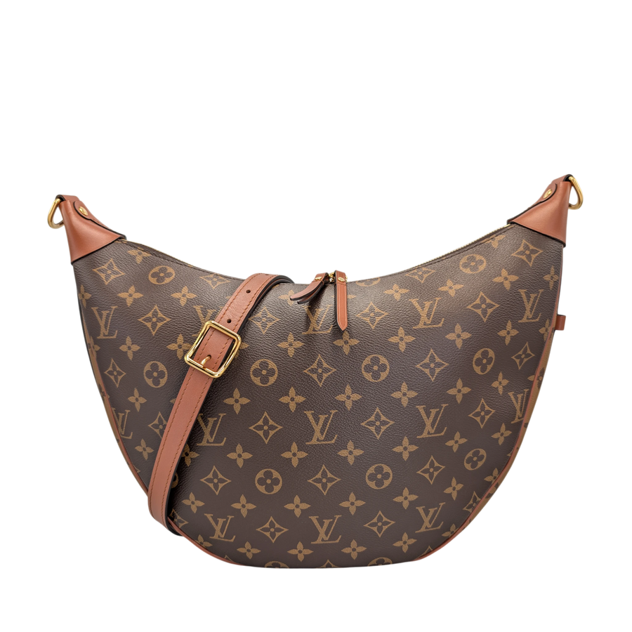 Secondhandbags AG Louis Vuitton Loop Hobo bag in Monogram Reverse canvas with leather trim and gold hardware.