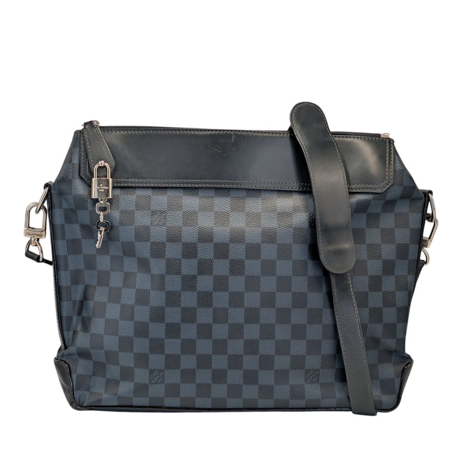 Secondhandbags AG Louis Vuitton Mick NM PM messenger bag in Damier Graphite canvas with leather trim and silver hardware.