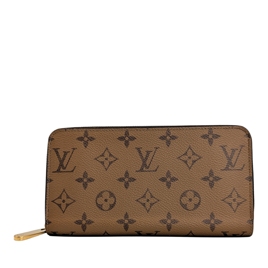 Secondhandbags AG Louis Vuitton Zippy Geldbörse aus braunem Monogram Reverse Canvas mit goldenem Reißverschluss